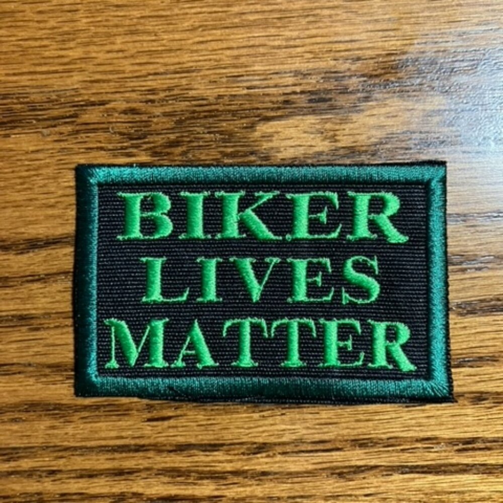 Biker Lives Matter embroidered patch in two shades of green and black background